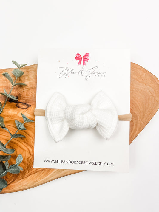 White Waffle Fabric Baby Bow Headband: Itty Bitty 2 Inch Bow