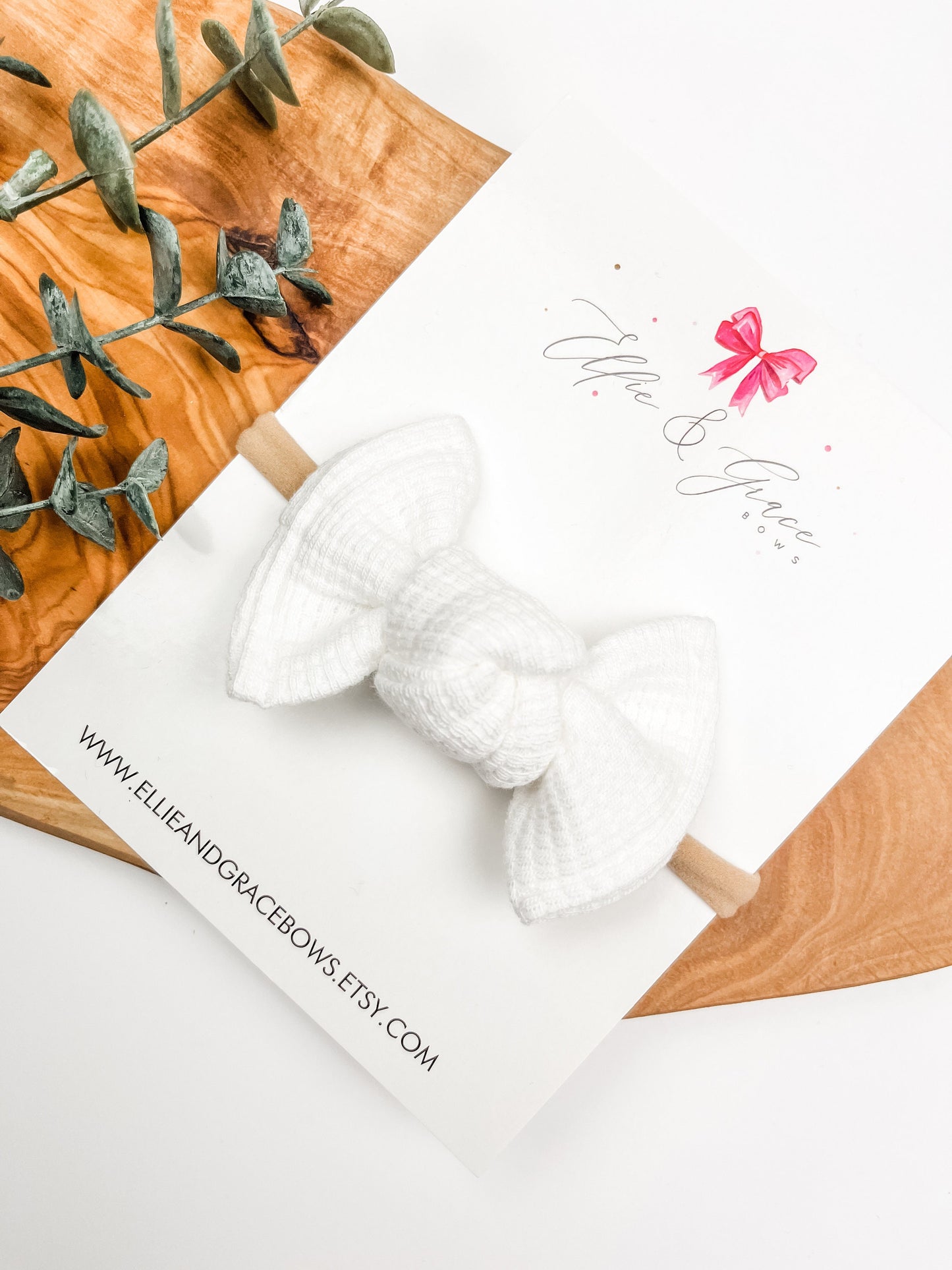 White Waffle Fabric Baby Bow Headband: Itty Bitty 2 Inch Bow